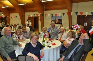 Image of members of Winslow Anglo French Twinning Association and visitors from Cours at the celebration dinner