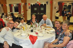 Image of members of Winslow Anglo French Twinning Association and visitors from Cours at the celebration dinner