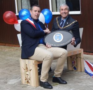 Image of the Mayor of Cours presenting a plaque to Gordon Wiseman, Mayor of Winslow during a visit to Winslow organised by the Winslow Anglo French Twinning Association